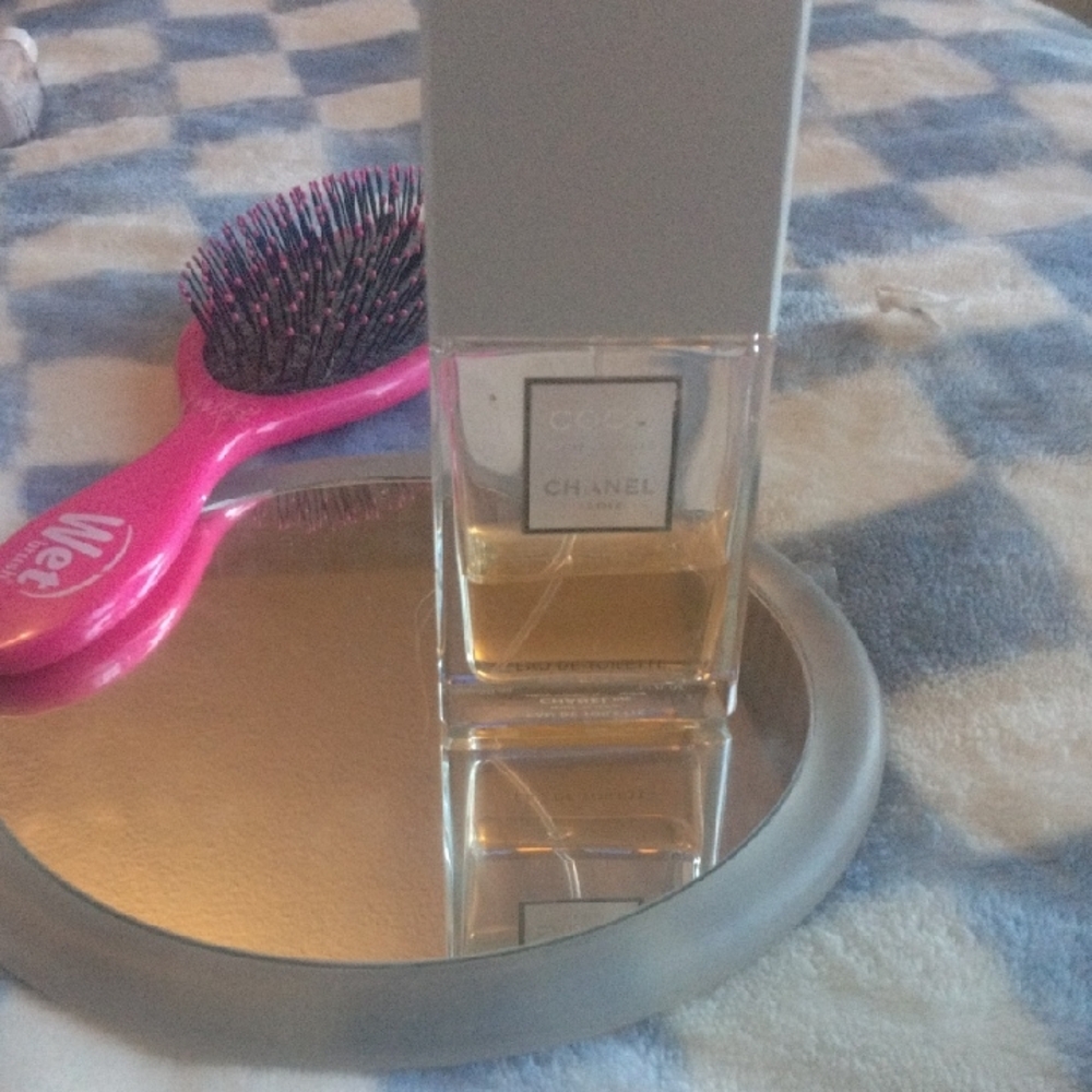 CHANEL Fragrance with Gold Hue